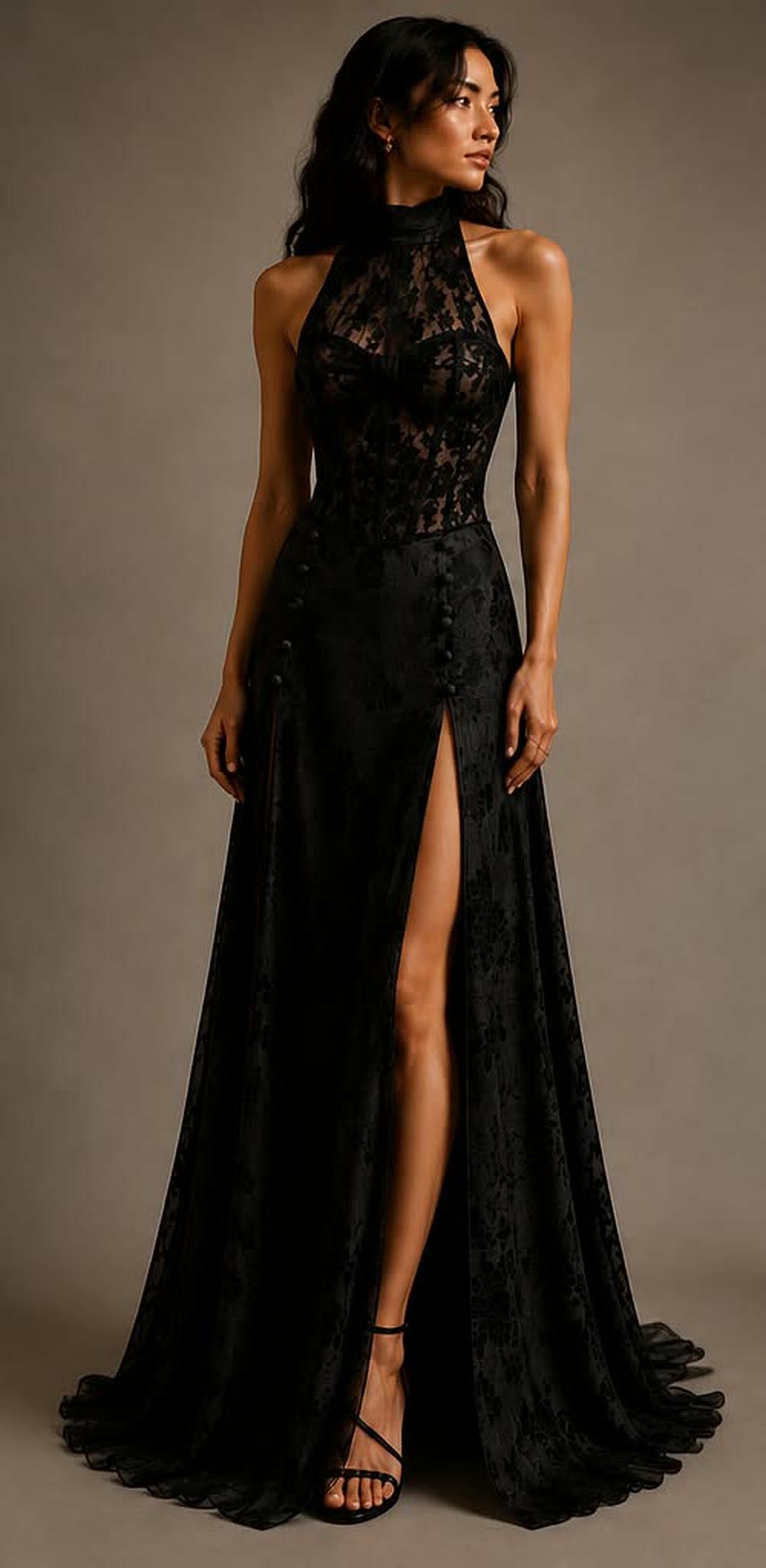 Black lace halter gown with a corset bodice and a high slit, front view