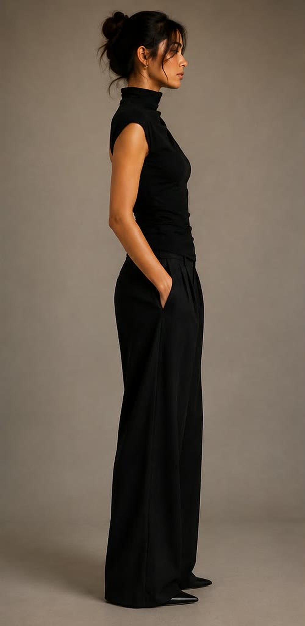 Side view of the high-neck top and wide-leg trousers