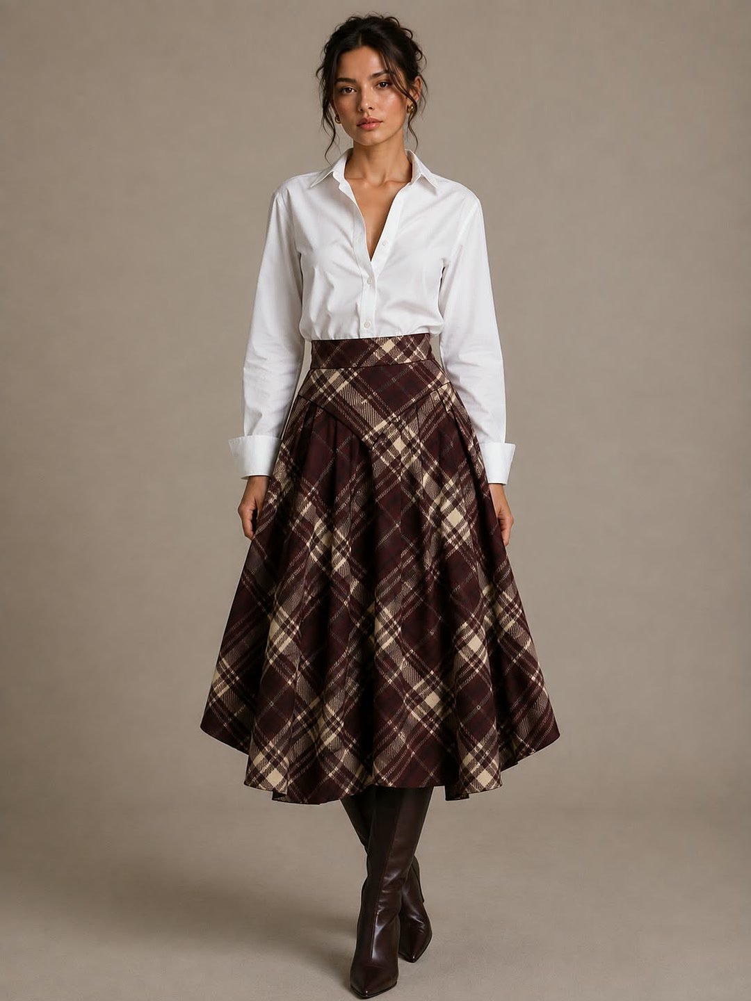 Plaid midi skirt with a white shirt and burgundy boots